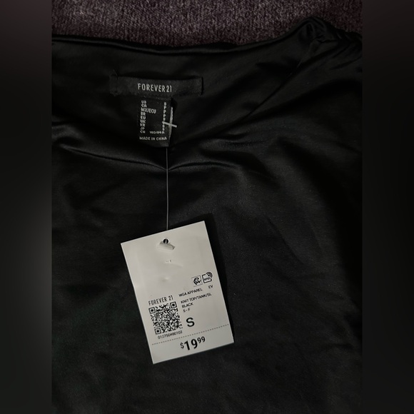 Forever 21
Contour Sculpt Asymmetrical Tank Top
Size: S - Picture 2 of 2